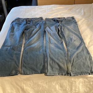 2 pairs Women’s original fit Carhartt jeans size 10